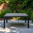 Műanyag rattan hatású kerti asztal antracit szürke 150 x 90 cm